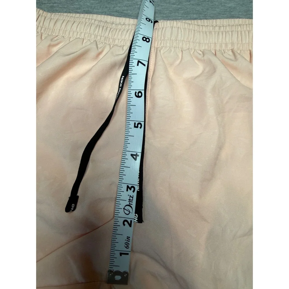 Nike Dri-FIT Women Running Shorts Peach Pink Mesh Trim Zip Pocket XS